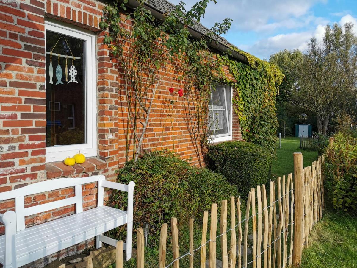 Ferienglueck An Der Nordsee Buche Deine Erdgeschoss-Ferienwohnung Mit Kamin Terrasse Und Eingezaeuntem Garten Fuer Unvergessliche Auszeiten Altfunnixsiel Bagian luar foto